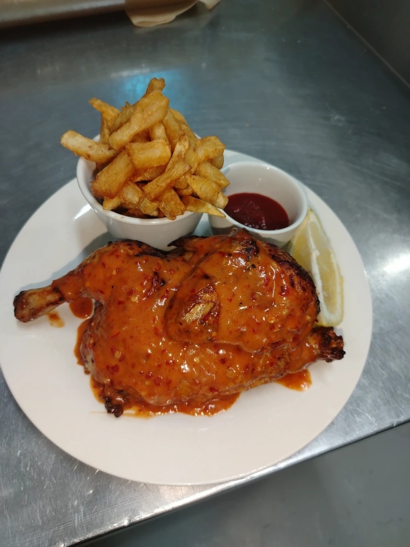 Half Chicken Served With Fries