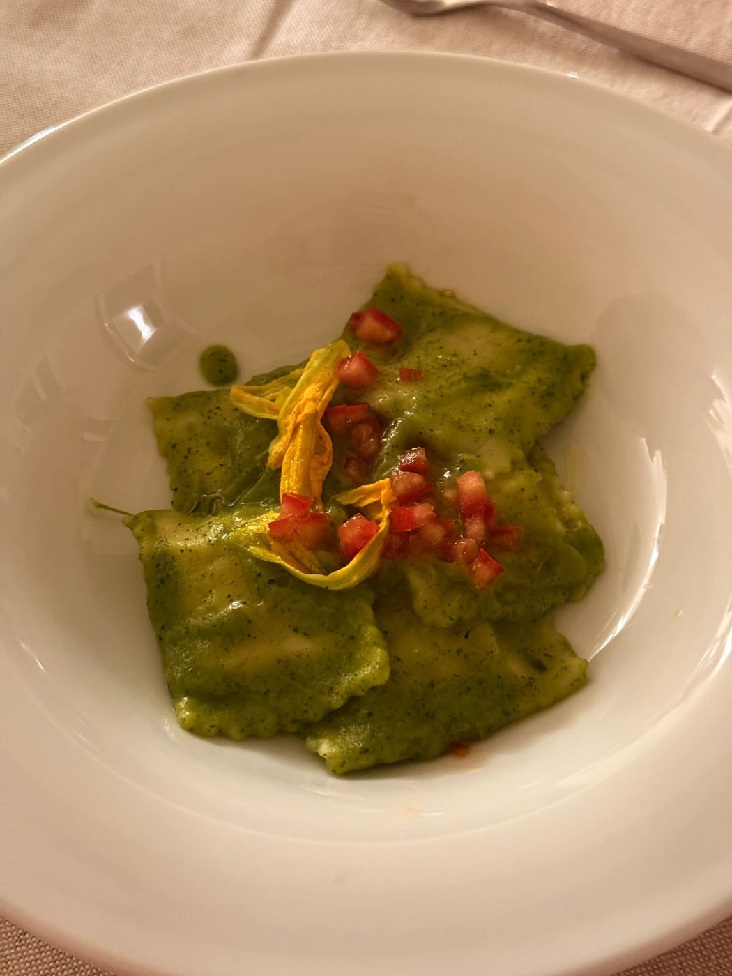 Ravioli di merluzzo con creme di zucchine (Cod ravioli with courgette sauce and courgette flowers).jpeg