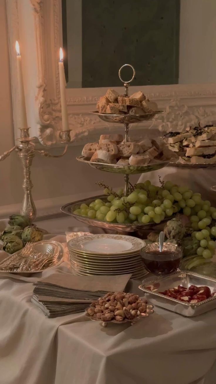 Elegant grazing table, silverware, drapery, draped tablecloth, chatcuterie, wedding table, table setting .jpeg