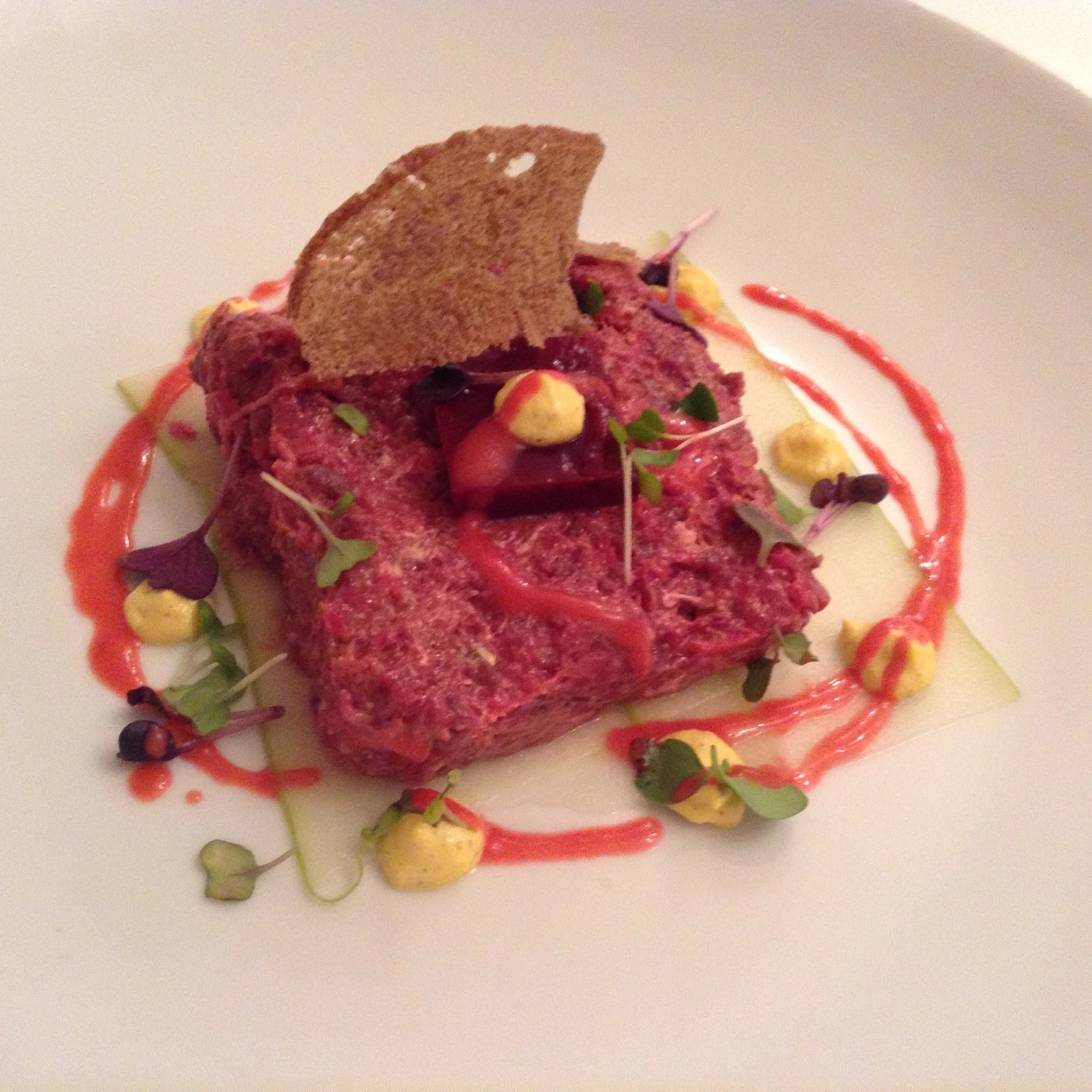 VENISON TARTARE WITH RED BERRY GELLE' AND RASBERRY VINAIGRETTE, GREEN APPLE.JPG