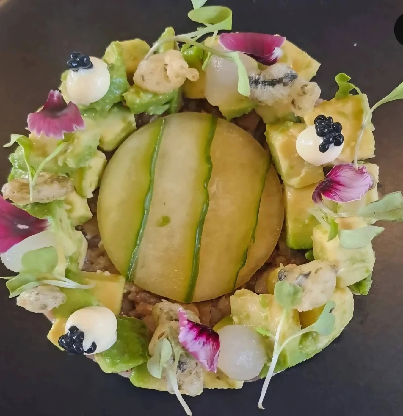 Tuna tartare with melon avocado pickled onion and caviar.jpg