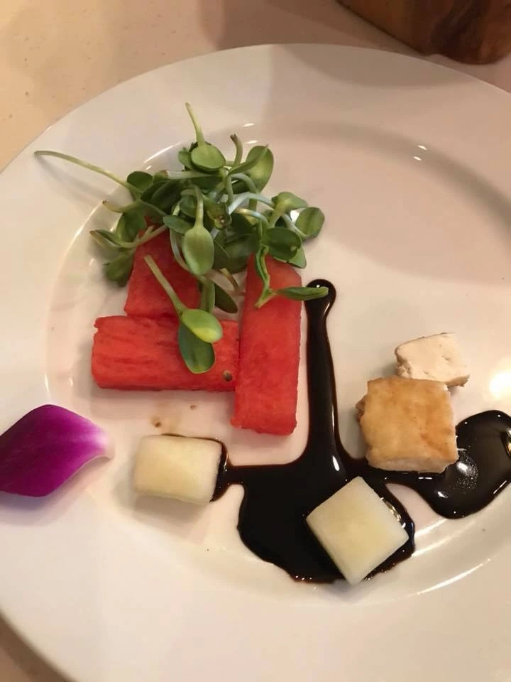 compressed watermelon salad with flaming haloumi cheese.jpg