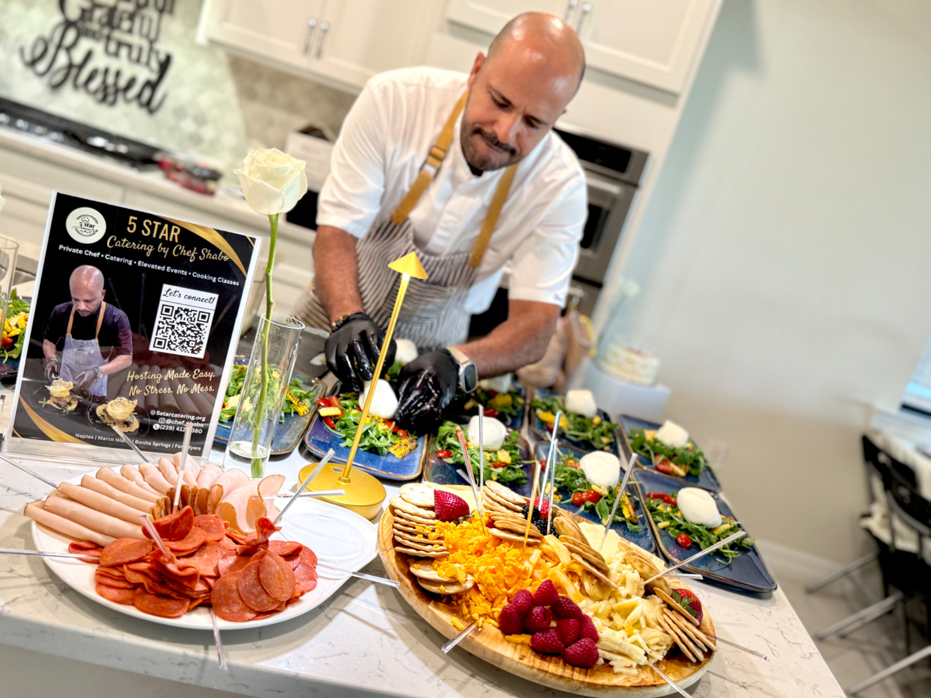 chef-shabo-plating-burrata-charcuterie-catering-naples.jpeg