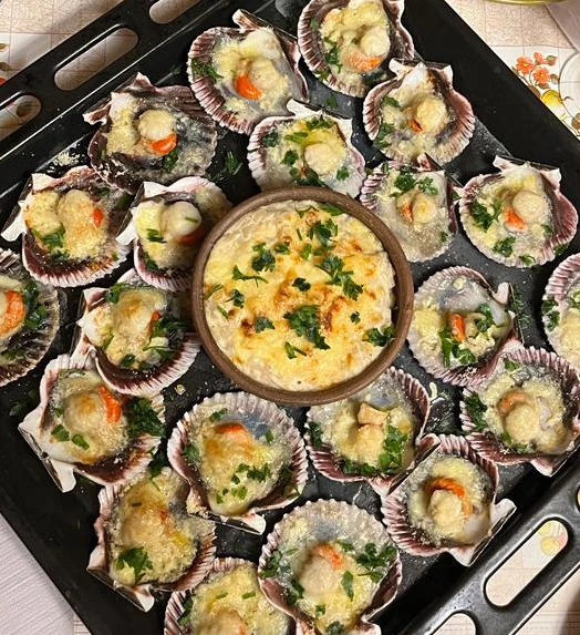 Ostiones a la parmesana.jpg Ostiones a la parmesana.jpg