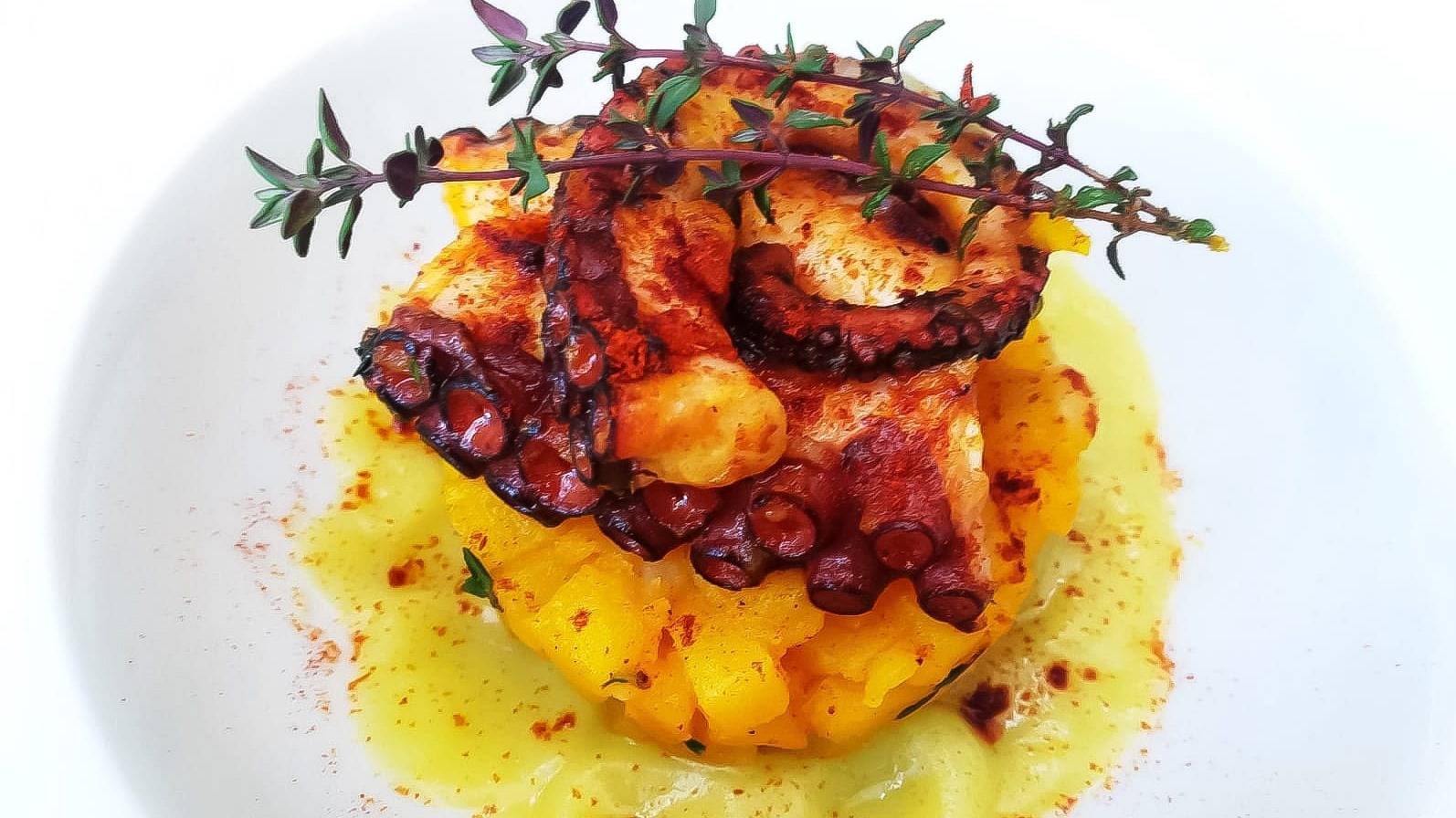 Paprika marinated octopus with saffron and thyme potatoes with leek cream.jpg