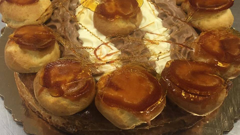 Gateau Saint-honoré. Puffy pastry with caramel, crème diplomat, and chocolate crème diplomat.jpg