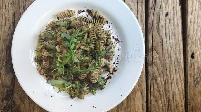nutty-fusilli-italian-pasta-chicken-vegetables-arugula-pesto-sauce-gluten-free-dish-flat-lay-top-view-nutty-fusilli-194757573.jpg
