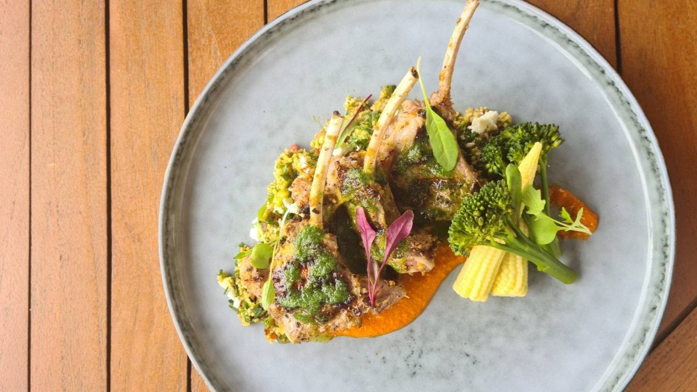 Moroccan lamb rack, pesto cous-cous salad, romesco sauce, steamed veg.jpg