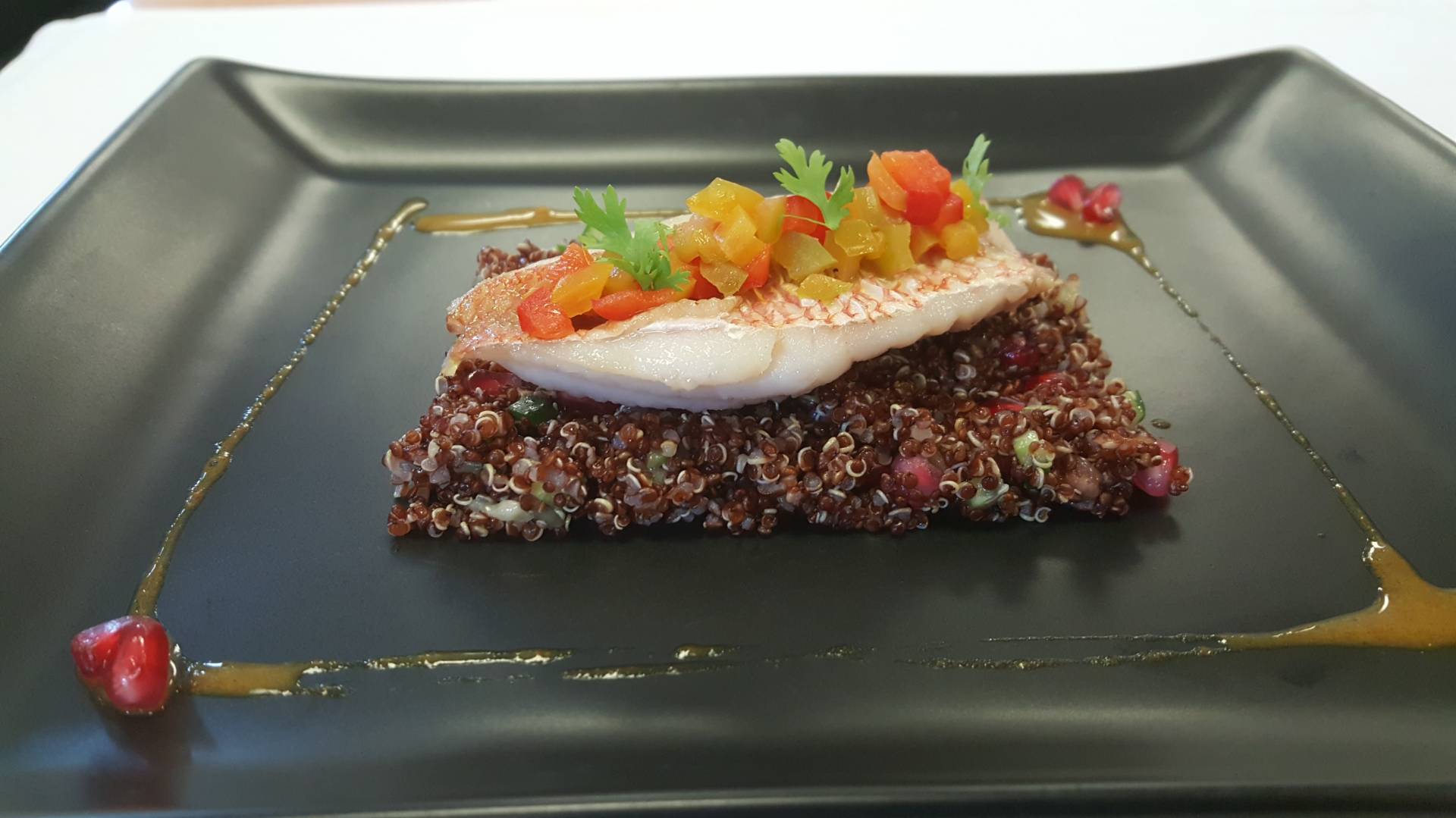 red mullet filet on quinoa risottoand pomagranate.jpg