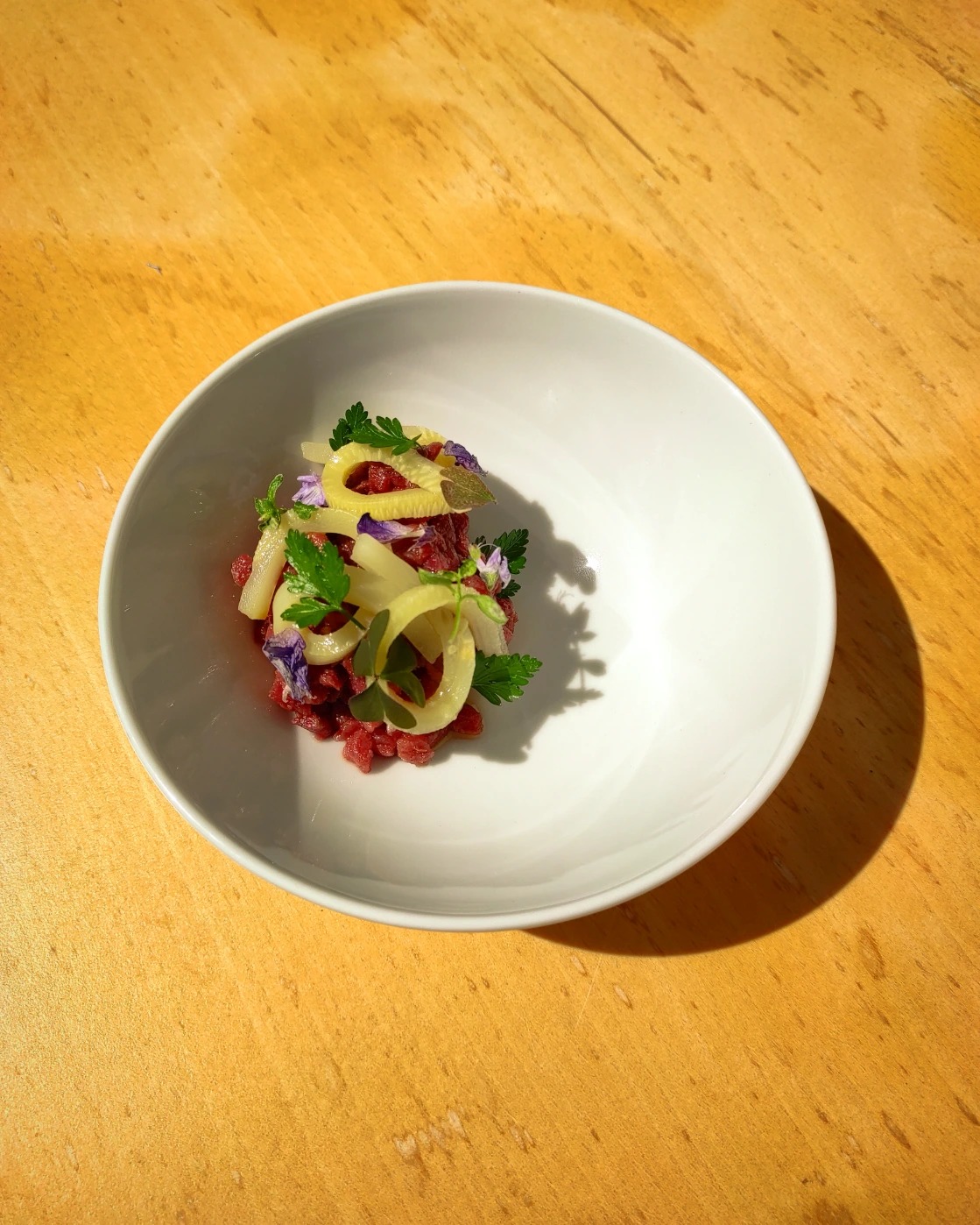 Wild boar tartare - pickles - wild flower bokeh.jpg