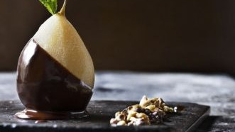 Chocolate dipped poached pear