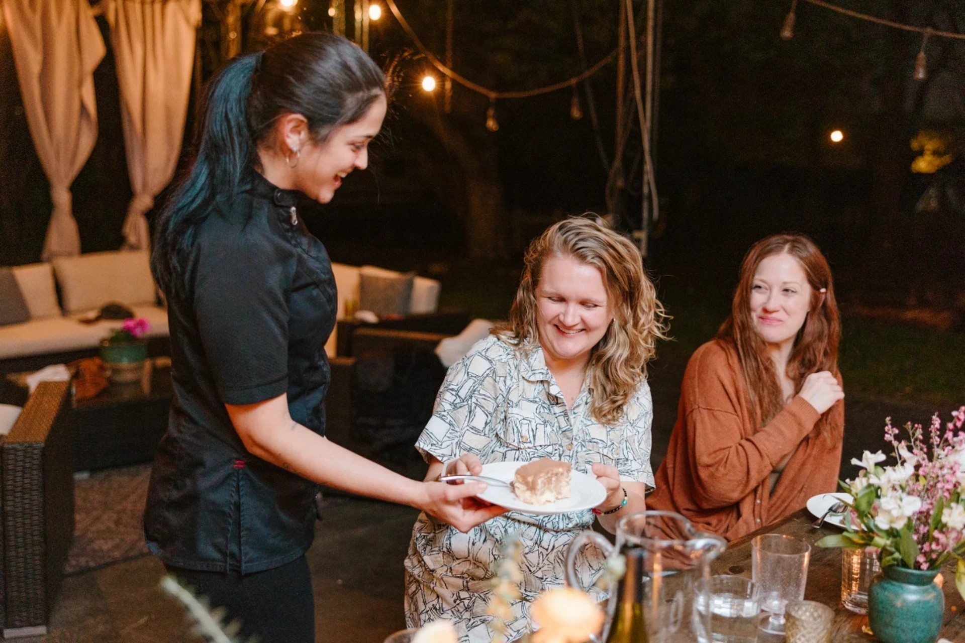 An elegant sushi dinner served with saucers and a teapot