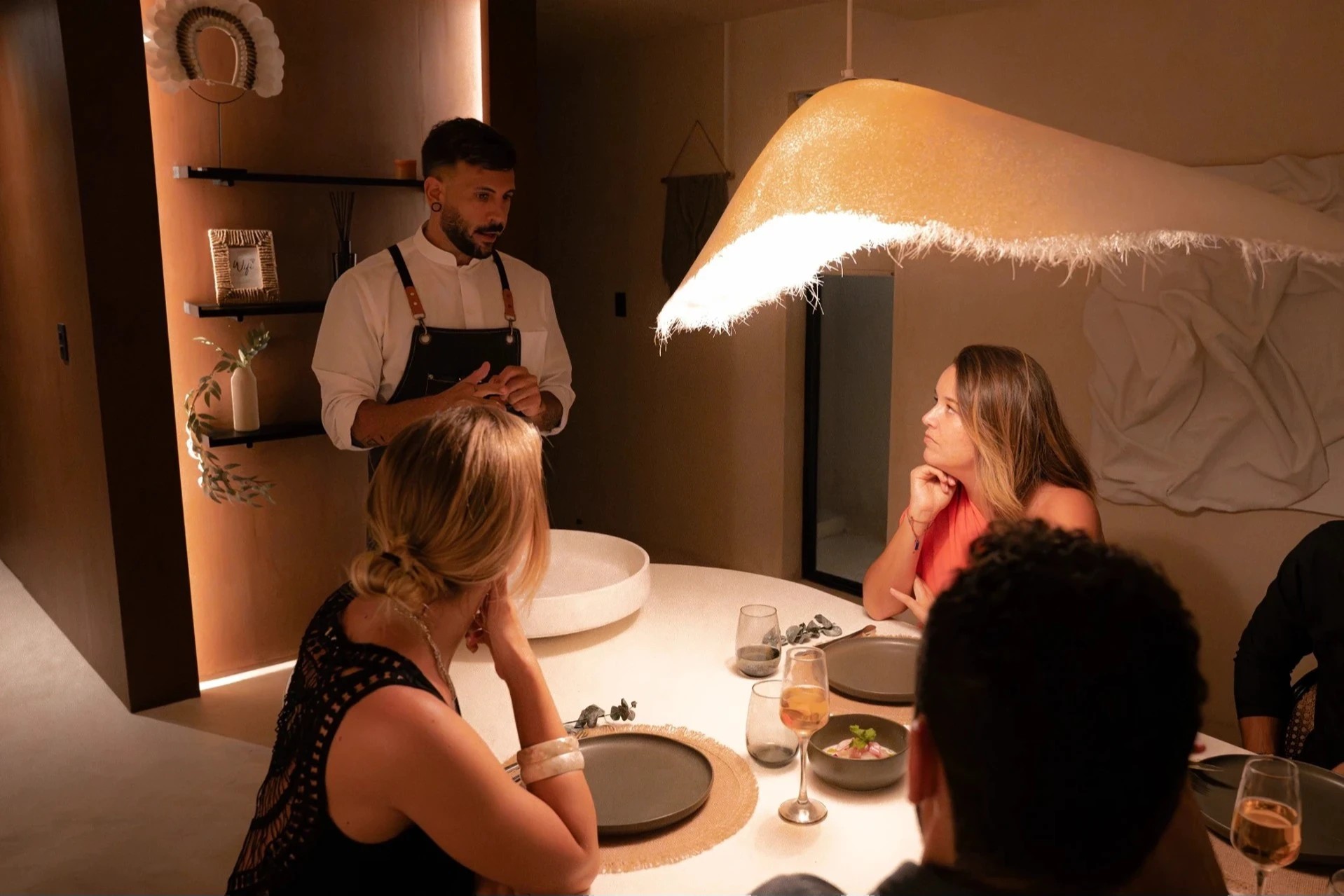 Chef grates vegetables into a bowl