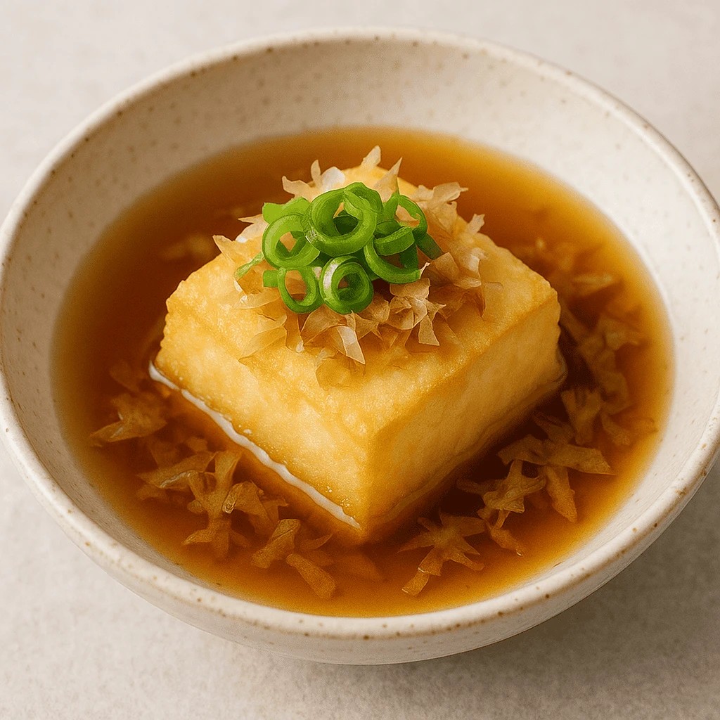Fried tofu served in a dashi broth