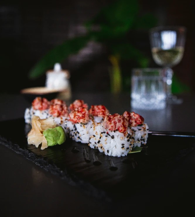 Sesame and rice balls topped with grounded waygu beef and served with wasabi and pickled ginger strips