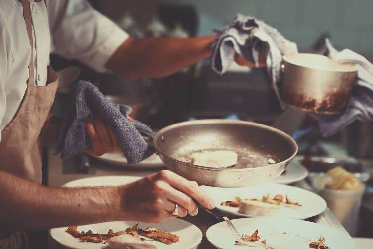 Private Chef preparing dishes for a dinner in London Private chef cooking in London